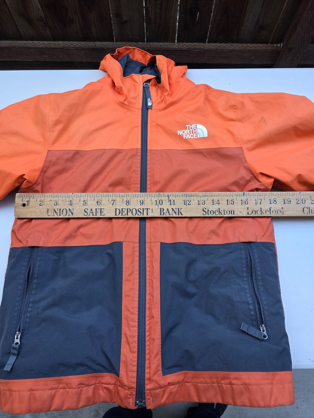The North Face Orange and Charcoal Colorblock Hooded Jacket